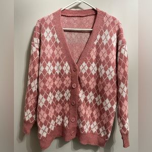 Cardigan-cute worn over under layer or alone.